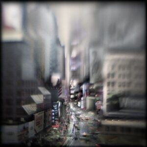 A blurry picture of the streets in a city.