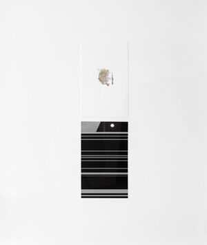 A white wall with black stripes and an apple logo.