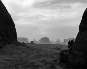 A black and white photo of some mountains