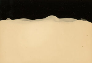 A black and white photo of some sand dunes
