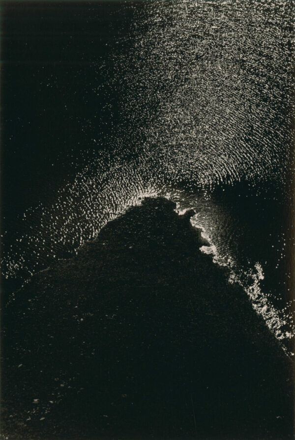 A black and white photo of the ground.