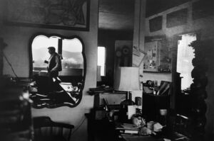 A man standing in front of a mirror.