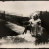 A black and white photo of an old woman