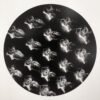 A black and white photo of many different faces