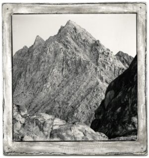 A black and white photo of mountains with no one in it.