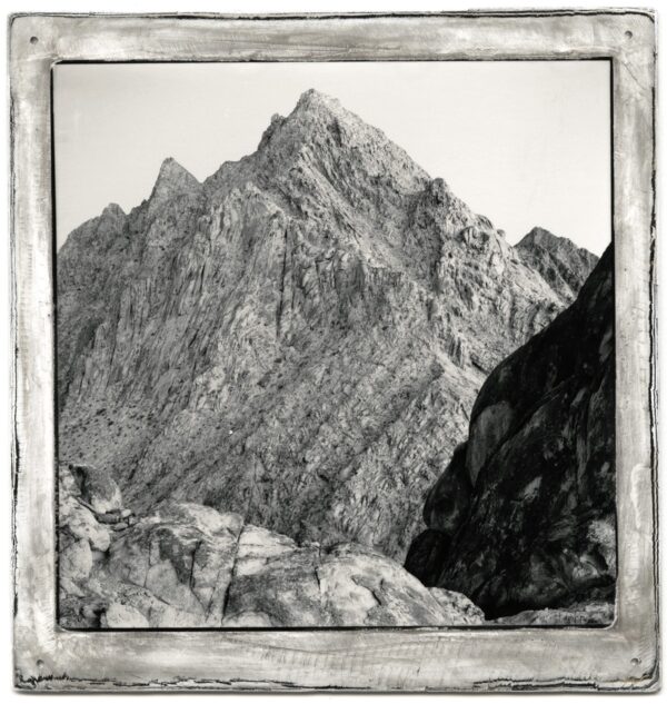 A black and white photo of mountains with no one in it.