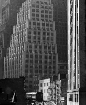 A black and white photo of buildings in the city.