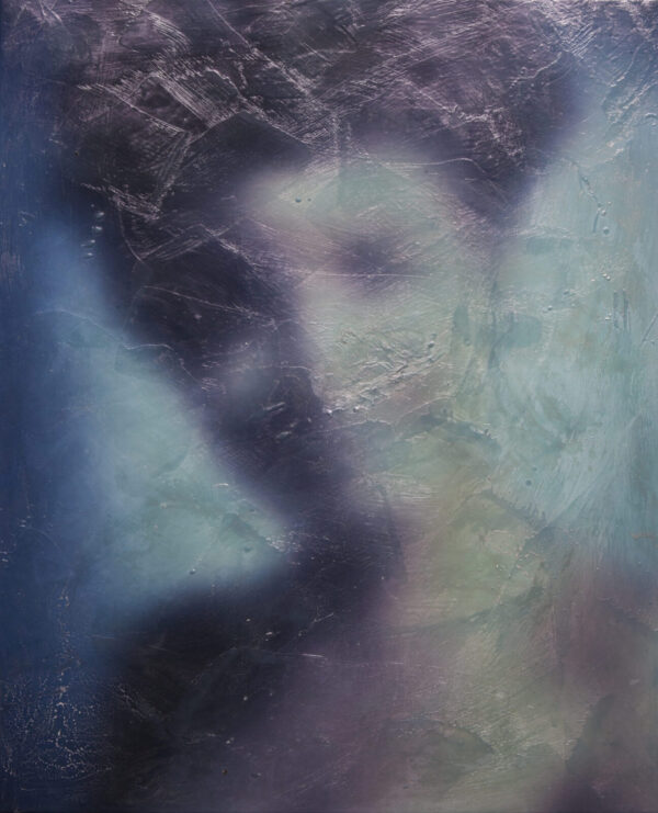 A blurry image of a person 's face in the water.