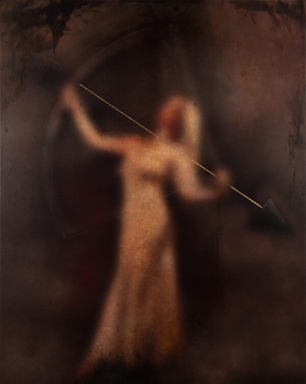 A blurry image of a woman holding an arrow.
