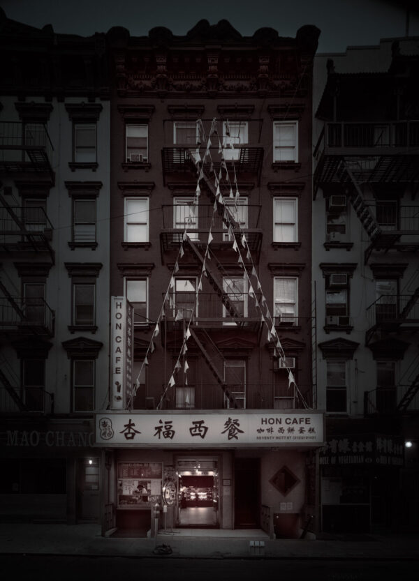 A building with many windows and lights on it