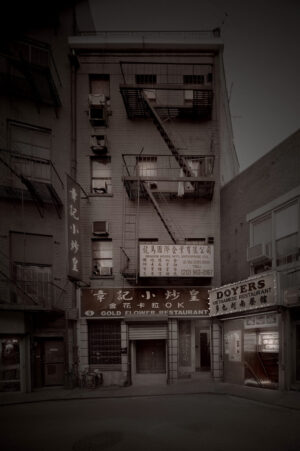 A building with many windows and signs on it