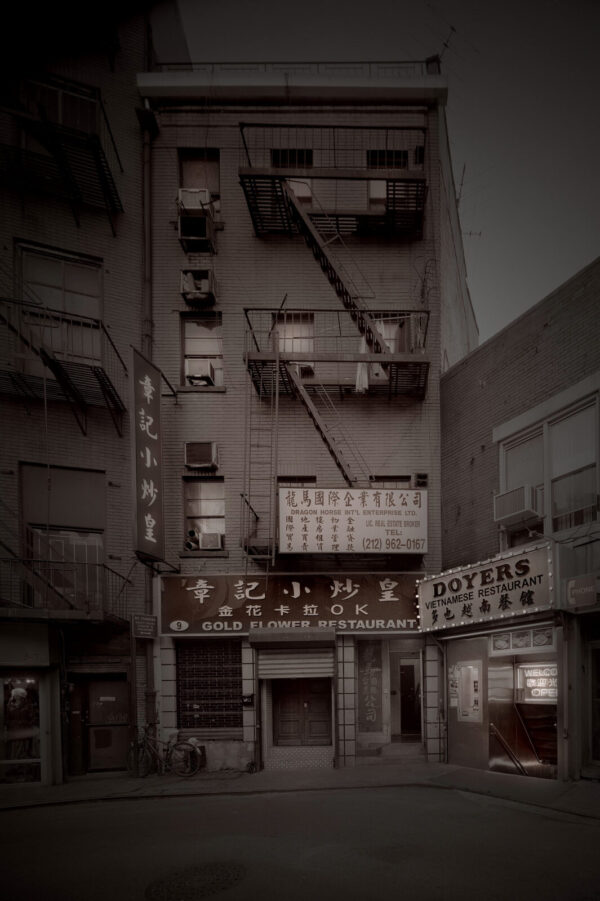 A building with many windows and signs on it