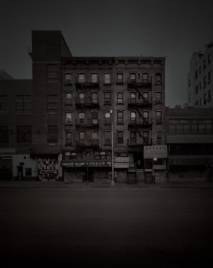 A black and white photo of an old building.