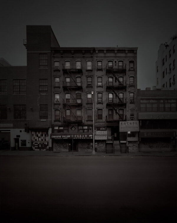 A black and white photo of an old building.