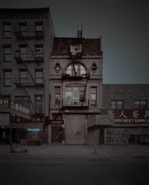 A black and white photo of an old building.