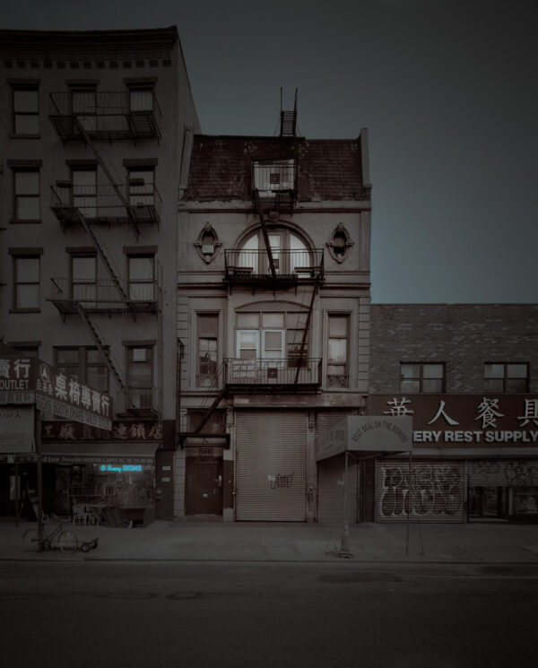 A black and white photo of an old building.