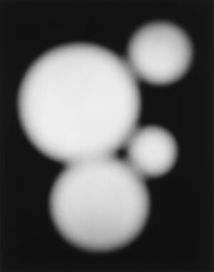 A black and white photo of some balls