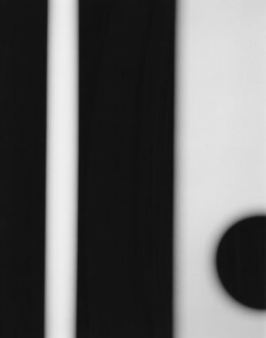 A black and white photo of a striped background.