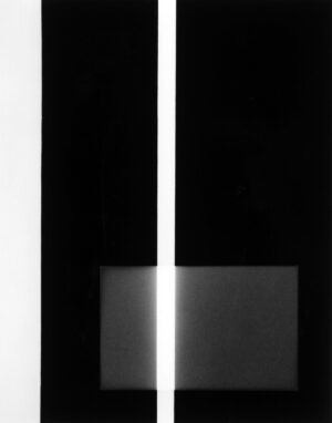 A black and white photo of two pillars.