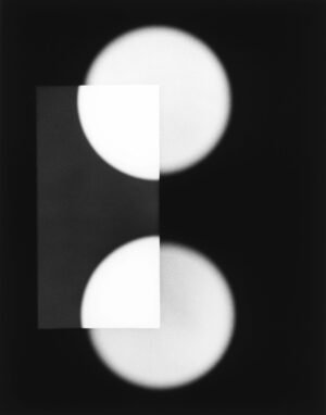 A black and white photo of two circles