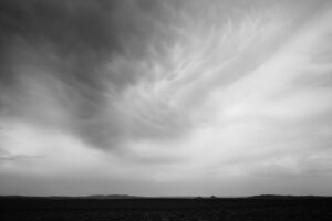 A black and white photo of the sky