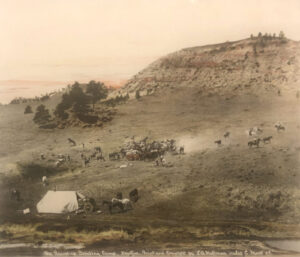 A group of people on top of a hill.