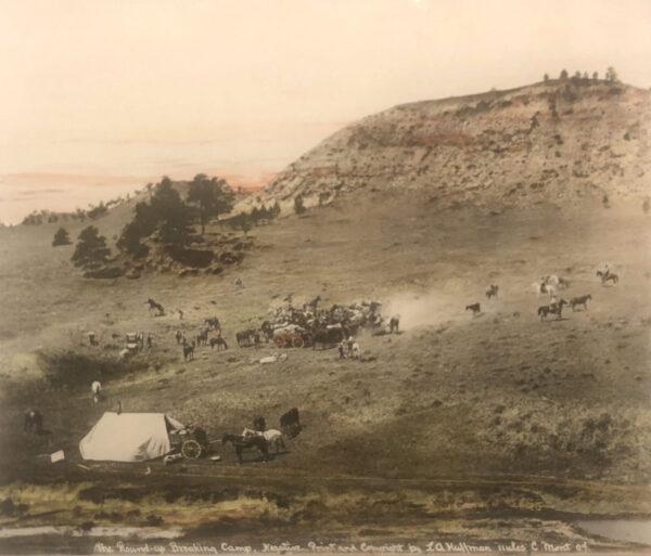 A group of people on top of a hill.