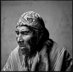A man with a beard and a turban on.
