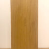 A wooden board with some writing on it