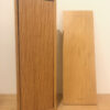 Two wooden boxes are sitting on the floor.