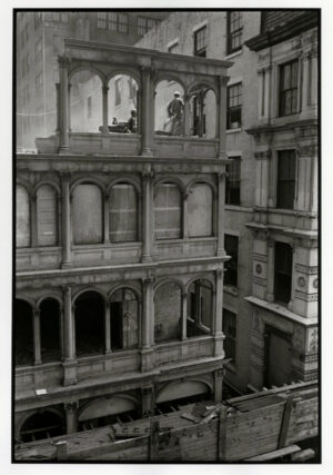 A black and white photo of an old building.