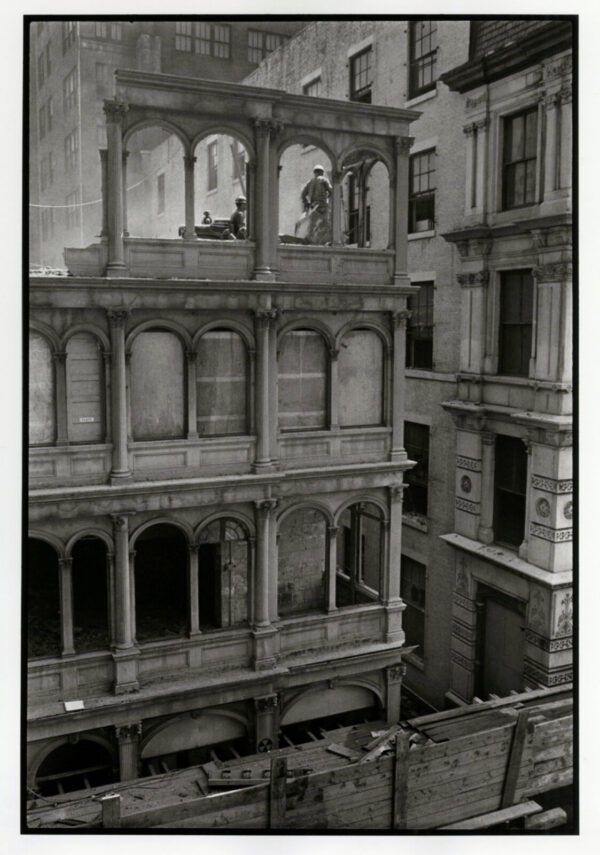 A black and white photo of an old building.