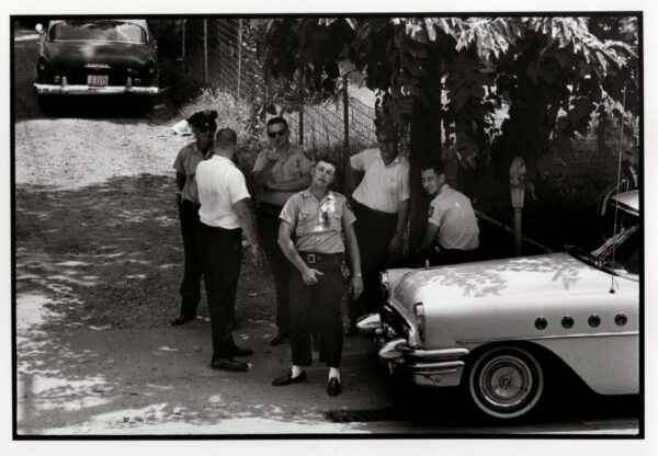A group of men standing next to each other.