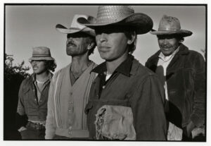 A group of men standing next to each other.