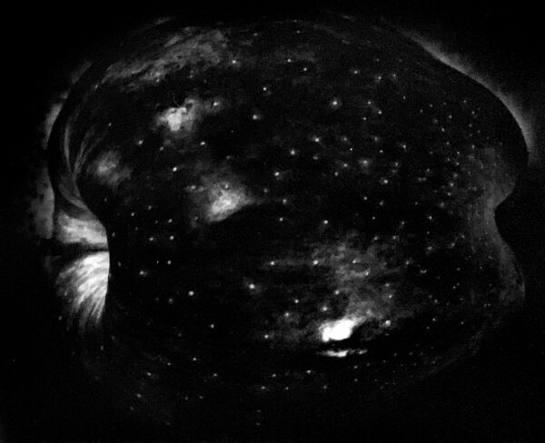 A black and white photo of the night sky.