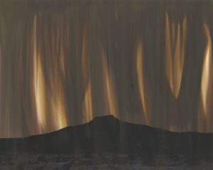 A painting of the night sky with light shining on it.