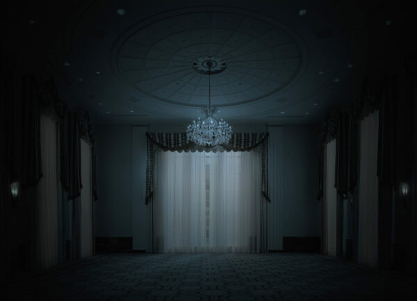 A room with curtains and lights on the wall