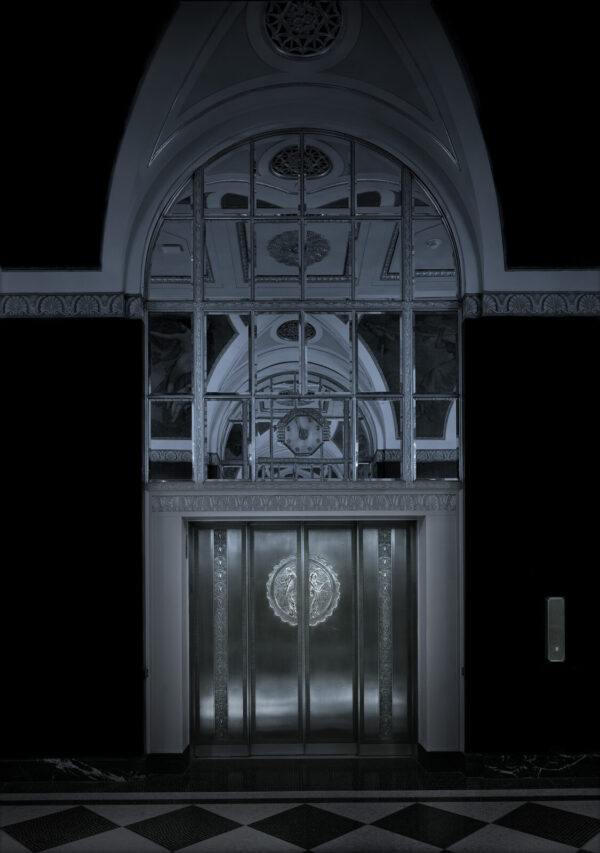 A door with a window and a clock on it