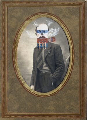 A man with glasses and a beard wearing a suit.