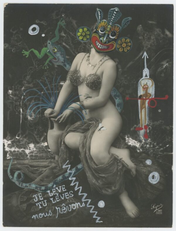 A woman with long hair and bare breasts is sitting on the ground.