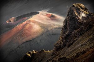 A mountain with a lot of smoke coming from it