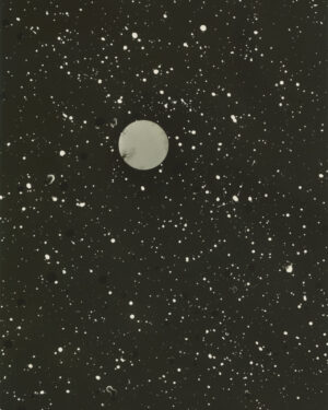 A black and white photo of the moon in the night sky.