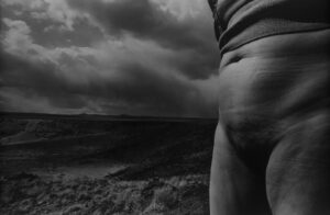 A black and white photo of a person 's butt