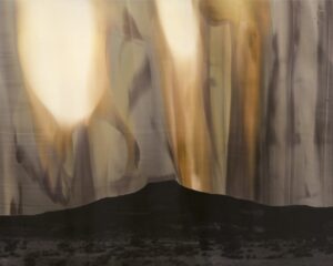 A painting of a mountain with yellow and brown light coming from it.