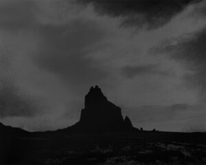 A black and white photo of some mountains
