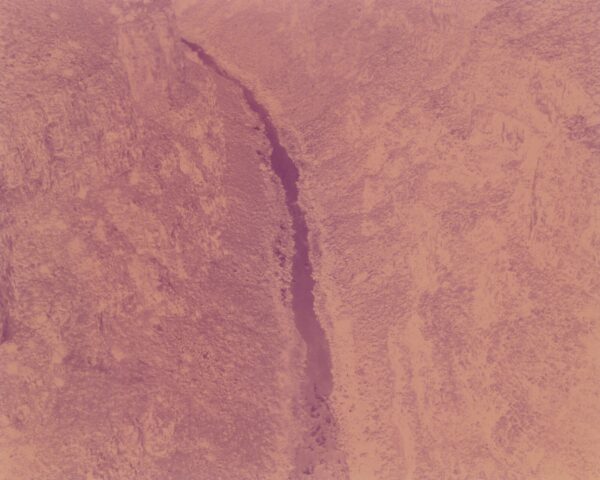 A pink background with a small waterfall in the middle.