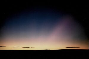 A blurry image of the sky at dusk.