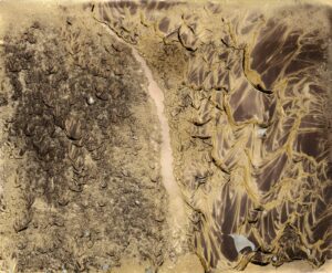 A close up of dirt and grass