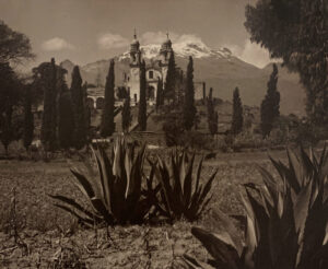 A black and white photo of a castle in the background.