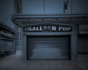 A large building with a sign that says balloon pop.
